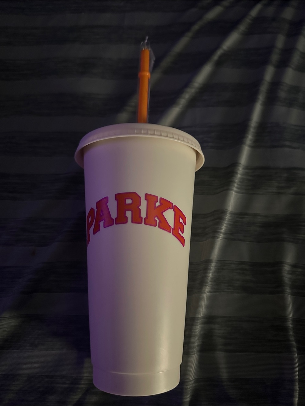 Parke Dunkin White Cup with Red Logo and Orange Straw